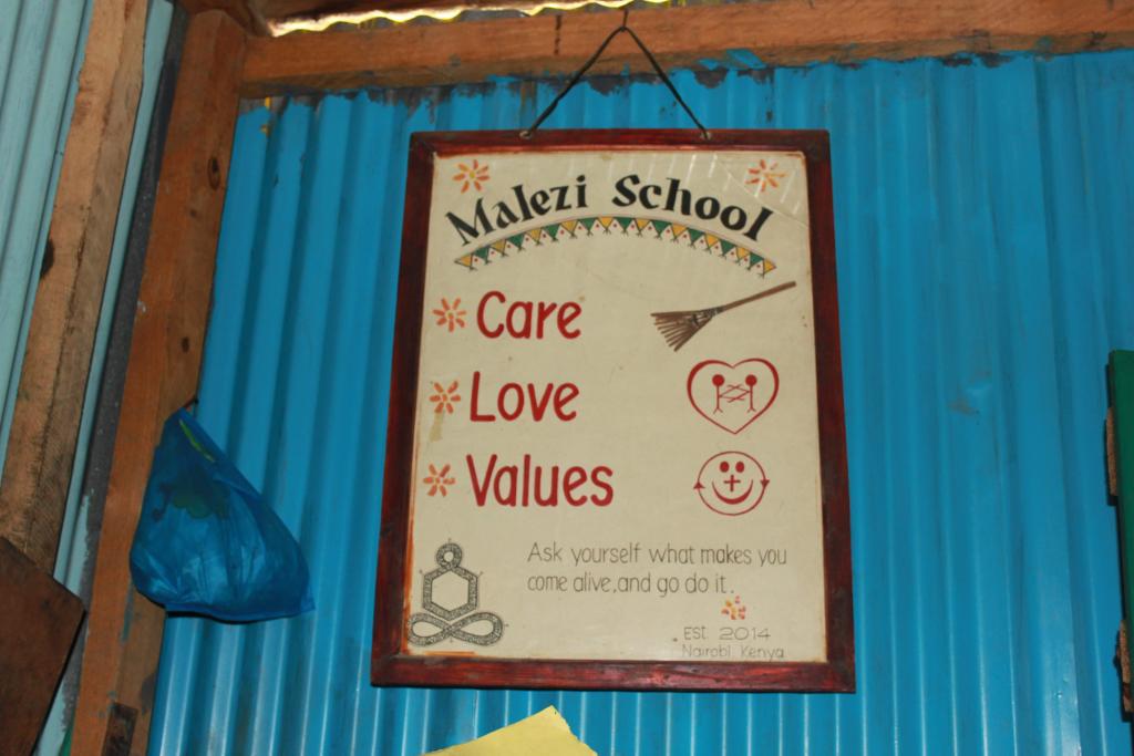 A sign in the Malezi school